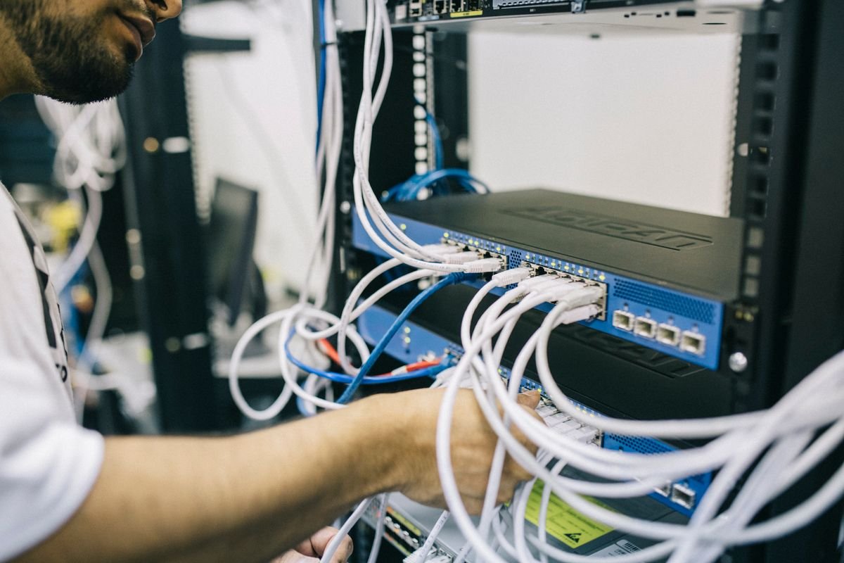 Ethernet cables connected to network switch ports
